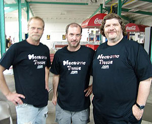 Dave Benton, John Everson and Bill Gagliani wearing the Necrotic Tissue zine t-shirts